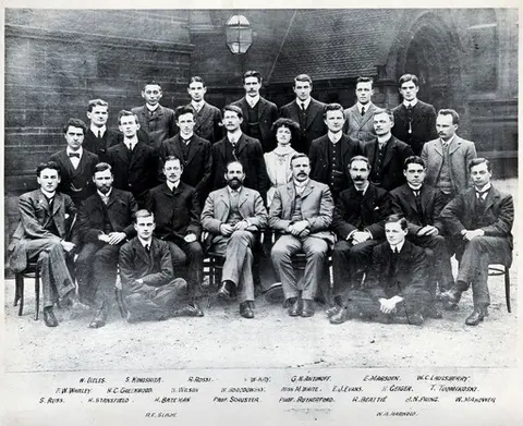 Professor Arthur Schuster and Professor Ernest Rutherford with students: Physics Department, Manchester University. Copy photograph after the ca. 1911 original.