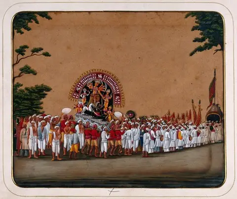 Durga Puja: a procession carrying an idol of Durga to honour her victory over evil.