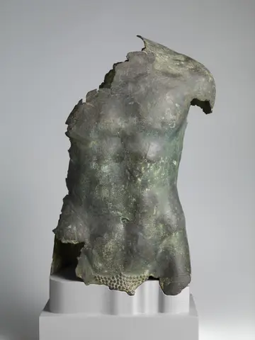 Bronze torso of a youth
